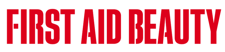 Red 'FIRST AID BEAUTY' logo on a transparent background